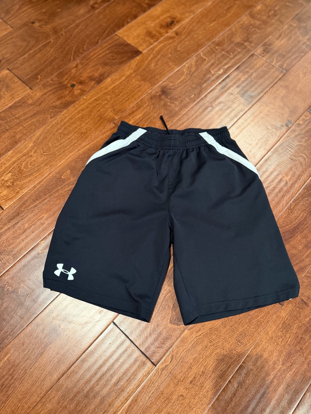 Under Armour Kids Youth Large Black Athletic Shorts with White Accents & pockets